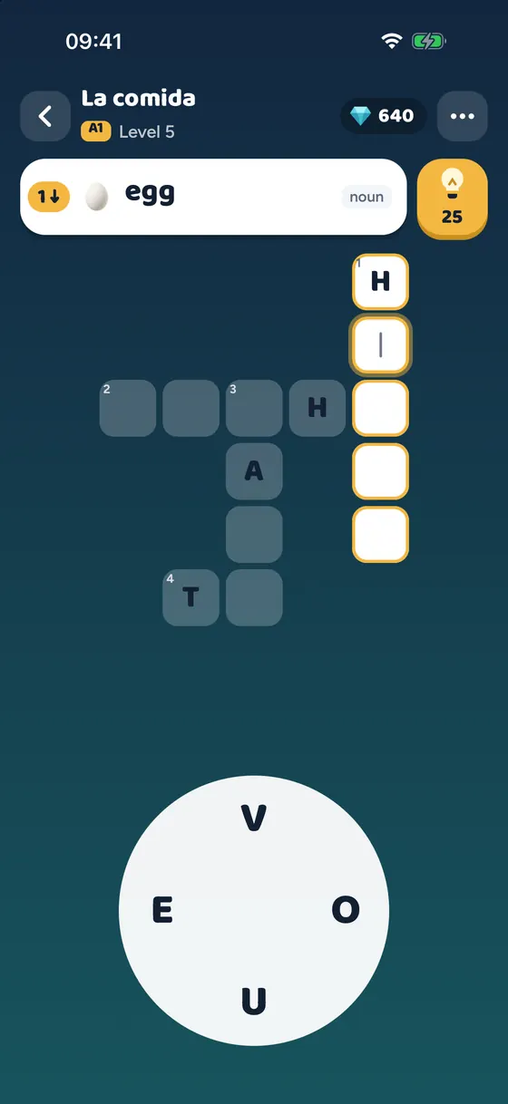 A Spanish crossword with the clue “egg” and an egg emoji, and a wheel of letters below the grid.